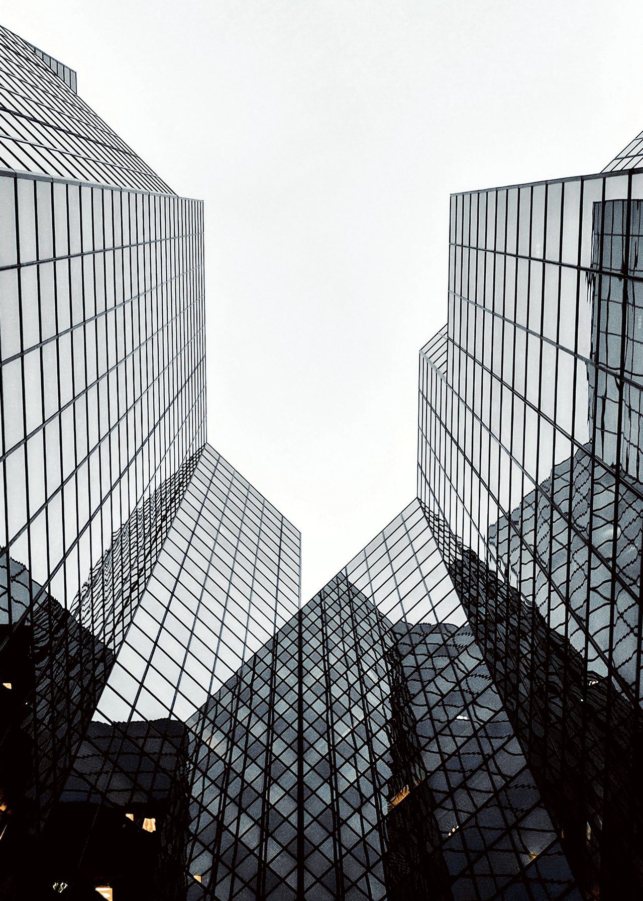 Modern glass office building, viewed from below