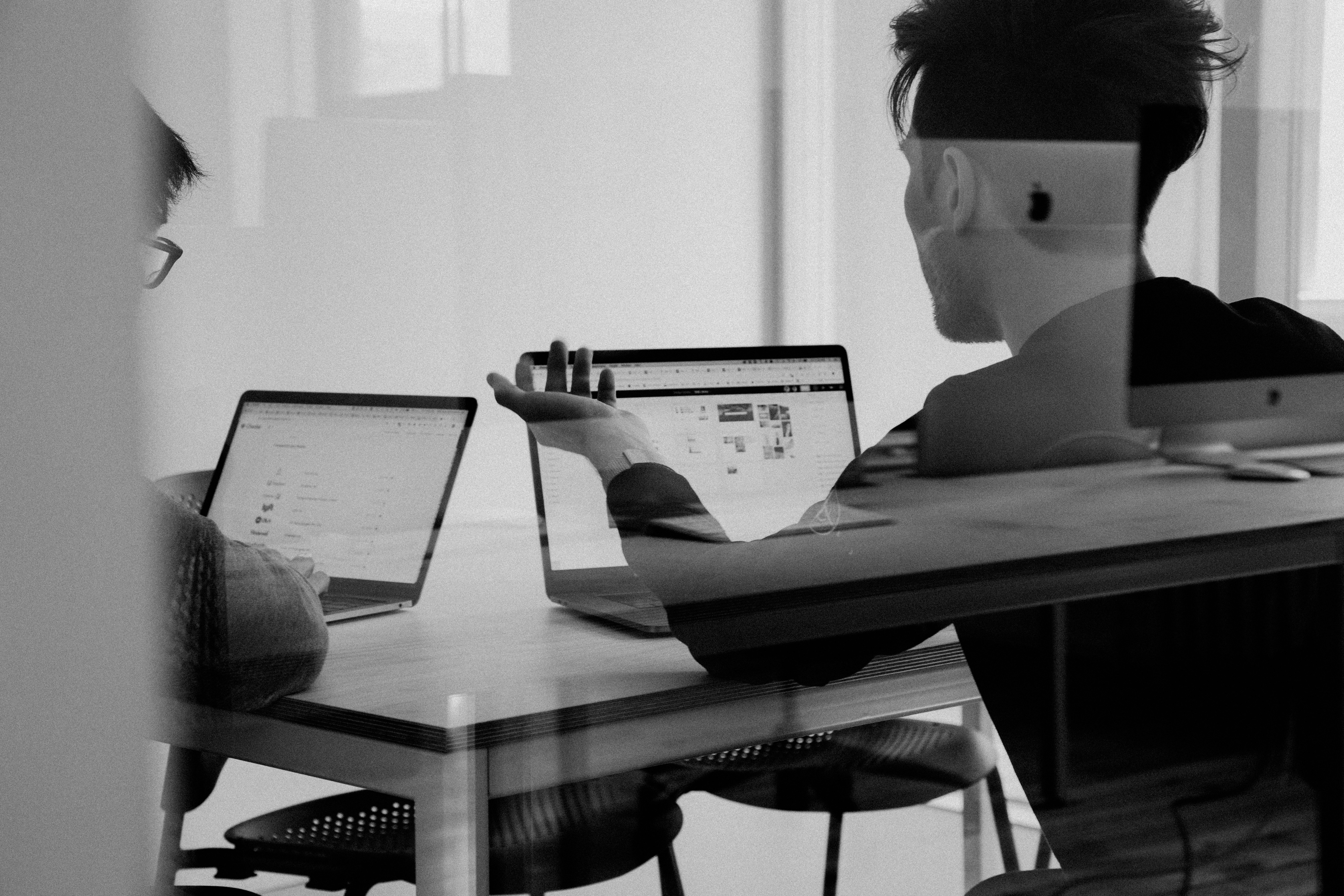 Consultants reviewing quality and operational data together